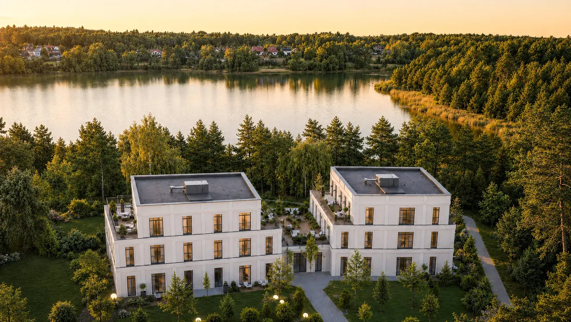 Wizualizacja inwestycji Lake Home nad jeziorem w Ośnie Lubuskim - widok z lotu ptaka o zachodzie słońca